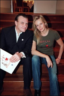 12/20/2001. Model Estelle Lefebure supports "Pour un monde plus juste, mets la pression" (for a fairer world, apply pressure) campaign.