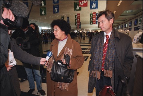 12/27/2001. EXCLUSIVE: Alleged WTC terrorist Zacarias Moussaoui's mother Aicha leaves for Washington with her son's new lawyer François Roux.