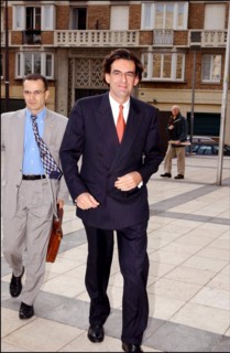 05/08/2002. Marie-George Buffet hands office over to Luc Ferry and Jean-Francois Lamour