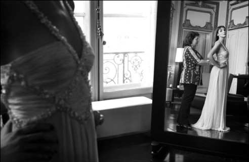 05/00/2003. EXCLUSIVE Clotilde Courau tries gowns on at Valentino's before the 56th Cannes Film