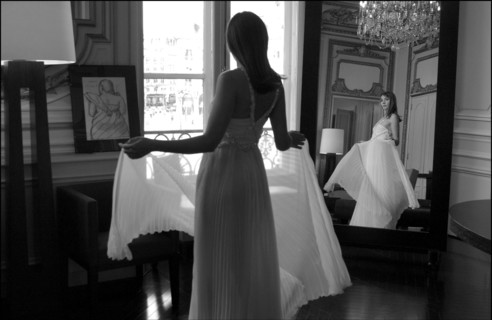 05/00/2003. EXCLUSIVE Clotilde Courau tries gowns on at Valentino's before the 56th Cannes Film