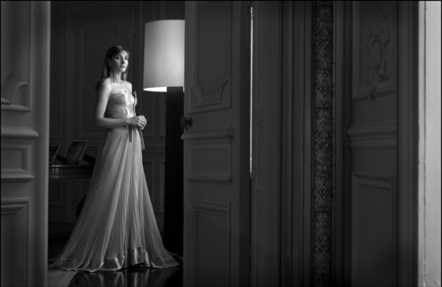 05/00/2003. EXCLUSIVE Clotilde Courau tries gowns on at Valentino's before the 56th Cannes Film