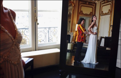 05/00/2003. EXCLUSIVE Clotilde Courau tries gowns on at Valentino's before the 56th Cannes Film