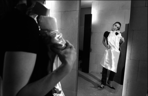 05/00/2003. Elodie Bouchez tries gowns on at Armani's before the 56th Cannes Film