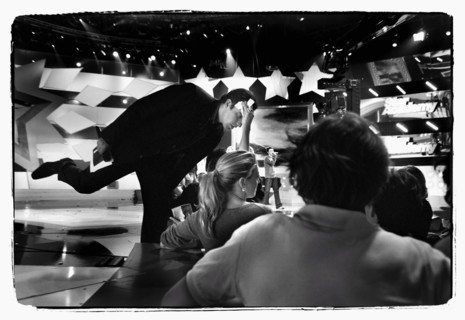 12/00/2003. Nikos Aliagas, host of the Star Academy shows backstage and on stage.