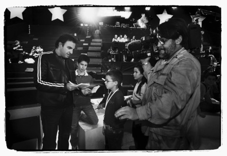 12/00/2003. Nikos Aliagas, host of the Star Academy shows backstage and on stage.