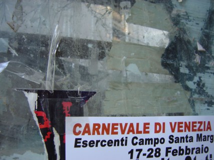Close-up of a sign indicating the carnival of Venice