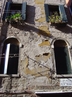 Rendered facade in a Venitian alley