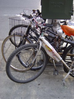 Bikes attached to a pillar in New York
