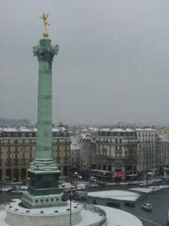 Bastille square under the snow in Paris