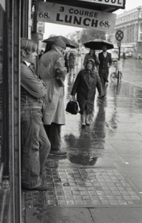 Sheltering from rain, O’Connell Street, Dublin