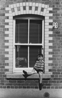 Boy in window, Ringsend, Dublin