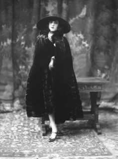 Female model wearing a fur coat designed by Max Leroy