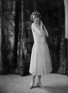 Annette Wills wearing a dress designed by Worth