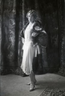 Annette Wills wearing a dress designed by Worth