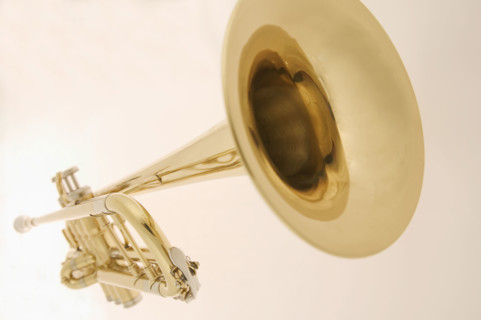 Extreme closeup of a trumpet.