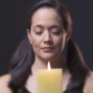 Woman with candle.