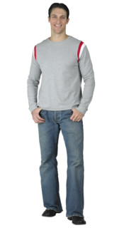 Casual guy with thumbs in his pockets.