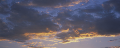 A hint of sunlight on clouds.
