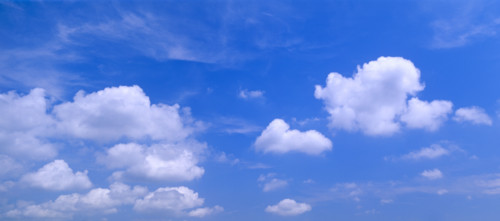 Clouds against a blue sky.