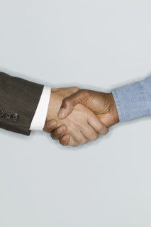 Two men shaking hands.