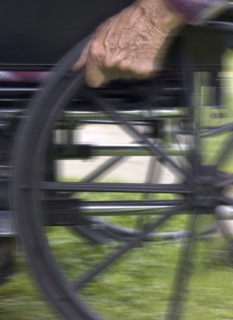 Elderly man in wheelchair.
