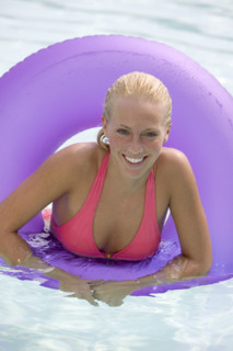 Young woman in a swimming pool.