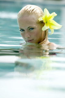A submerged woman in a swimming pool.