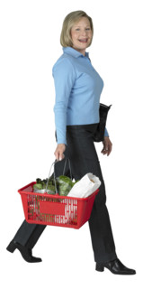 Woman carrying a shopping basket.