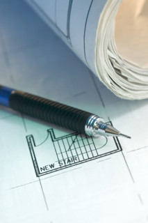 Architectural tool and blue prints.