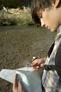 Hiker checking his map.