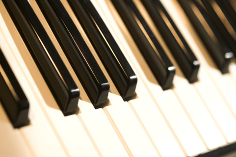 Closeup of piano keys.