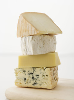 Stacked blocks of cheese.