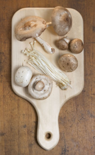 Mushrooms on cutting board.