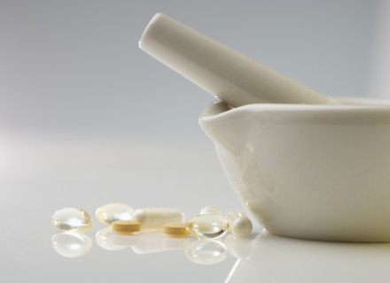 Pills with mortar and pestle.