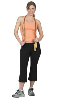 Young woman preparing to jump rope.