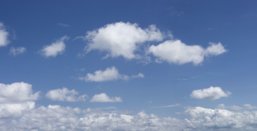 White clouds in blue sky.