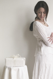 Woman looking at present.