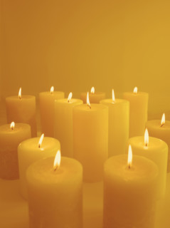 Still life of lighted candles.