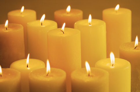 Still life of lighted candles.