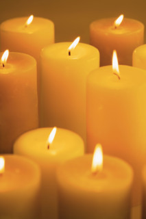 Still life of lighted candles.