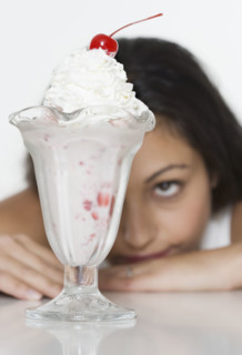 Woman wanting ice cream sundae.
