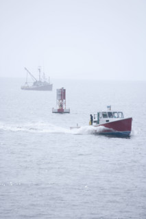 Lobster boat in fog off the Maine coast.