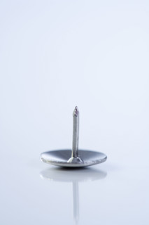 Still life of thumb tack.