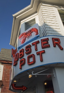 Neon sign for Lobster Pot restaurant.