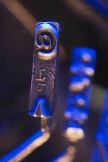Closeup of typewriter printing plates.