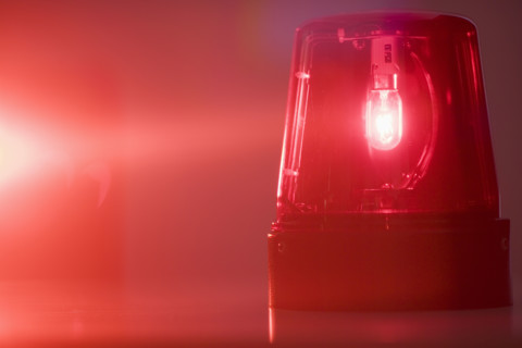 A glowing red emergency light.