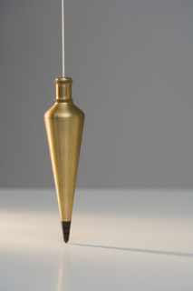 Plumb bob suspended from plumb line.