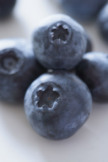 Extreme closeup of blueberries.