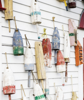 Buoys on a wall in Maine.
